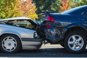 A collision between two cars in Petaluma in a sunny morning.
