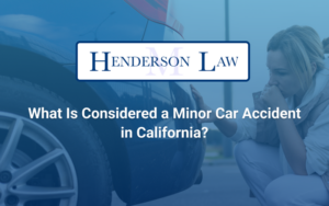 A Damaged car with the text: 'What Is Considered a Minor Car Accident in California?' at Henderson Law